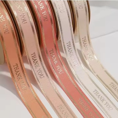 kupować Zindywidualizowana wstążka z folii złotej z poliestru z logo 3D na święta i urodziny online manufacture